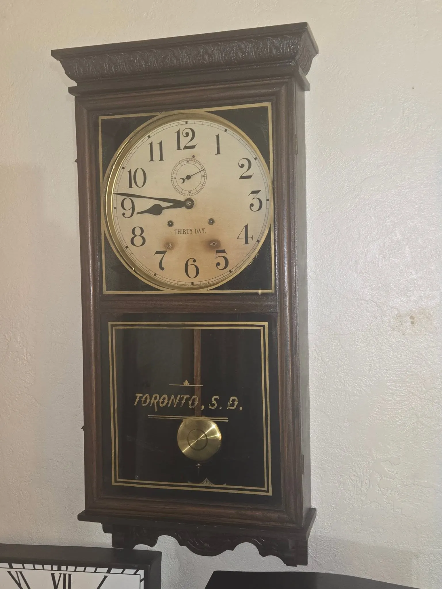 Vintage Thirty Day wall regulator clock with painted glass panel and brass pendulum bob