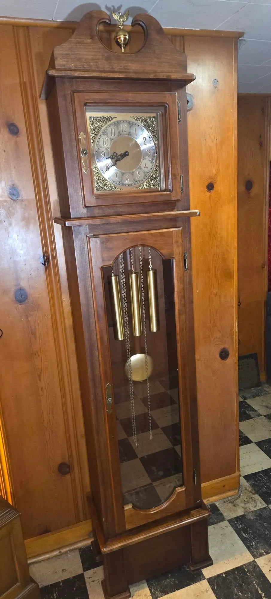 Cherry-wood grandfather clock with eagle finial, moon-phase dial and brass tube chimes